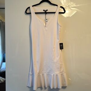 White body contour, sweetheart neckline, ruffle edge dress. Never worn. Express.